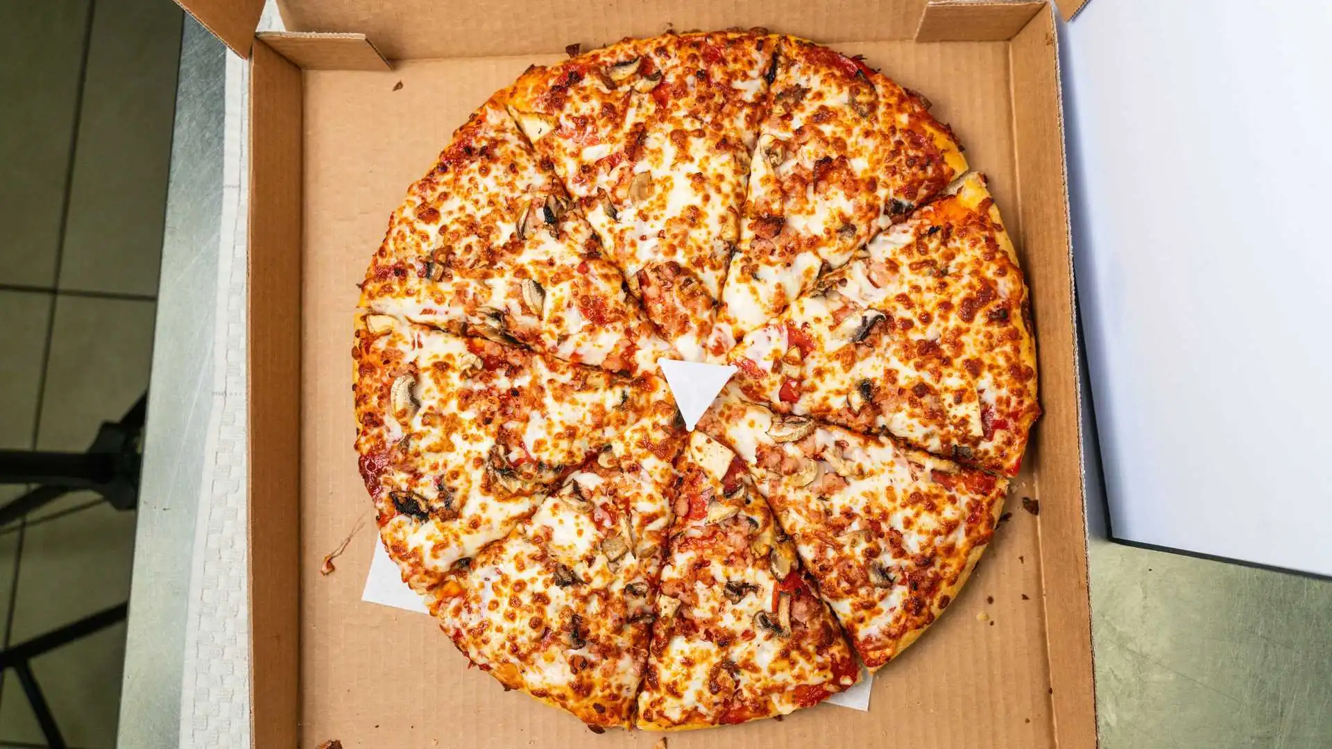 Organic pizza and Indian-inspired specialties at Boss Pizza Edmonton